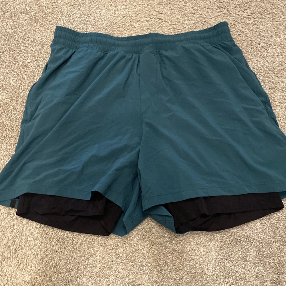 Lululemon Pace Breaker lined shorts in a teal